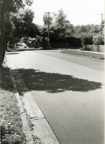 Black and white photograph of Brunswick Road, Mitcham, looking East.
