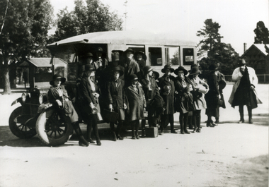 Mitcham Girl Guides taken beside bus which ran between Vermont and Mitcham in the 1920s.