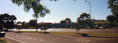 Mitcham Road looking south from near Milne Street Mitcham with garages and industrial shops.