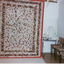 Quilt, usually on display in Cottage, hung at Embroiders' Guild in 1999 for Photo to be taken for inclusion in 'Australia's Quilts' by Jenny Mannin