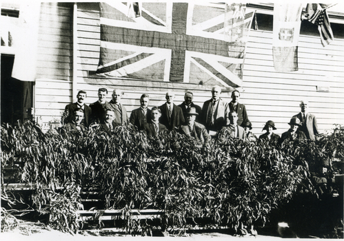 Black and white photo of Mitcham State School decorated to welcome home Servicemen from the 1914-1918 War.