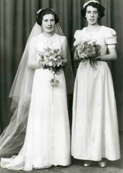 Black and white photograph of Mavis Brown in her Wedding dress with her sister Bette (married name Jones).