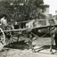 Black and white photograph of Arthur with daughter Muriel Jones in a horse and buggy, drawn by their pet horse 'Jack',on Jones' Flower Farm in Mt Pleasant Road, Nunawading, in 1936.