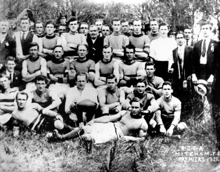 Black & white copy of a photograph Mitcham Football Club member posing for 1921 Premiers photograph.