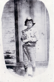 Photograph, Fred Collier with pet magpie