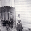 Black and white photograph of Fred Cecil and Blanche Collier outside the home in Tunstall.