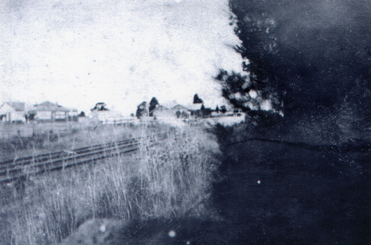 Black and white photograph of Tunstall and the Tunstall Gatehouse in Springvale Road, near the Tunstall Station.