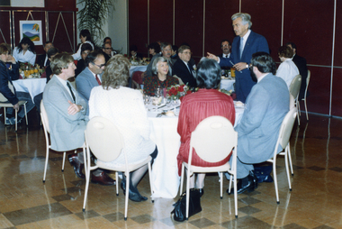 Bob Hawke, Prime Minister talking to one of the tables of guests at the Civic Reception for the Prime Minister at Nunawading in the Waratah Room of the Nunawading Arts Centre in 1989
