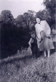 Black & white photograph of Doris Harris (1900-1975) with her grandson, 