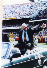 Bob Pratt being driven in a lap of honour around the Melbourne Cricket Ground.