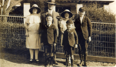 Michael McDonnell and his family outside their family home in Whitehorse Road (south side, four blocks from Rooks Road.) c1925.