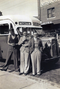 Leo McDonnell, age 15? (third from the left) in Whitehorse Road, Mitcham along side the Mitcham-Vermont bus in 1934,