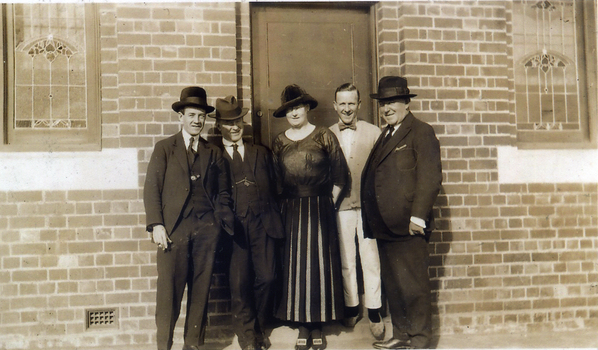 A group at the front of the Reserve Hotel. 