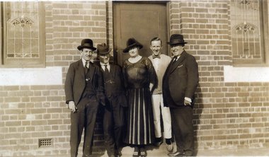 A group at the front of the Reserve Hotel. 