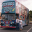 staff standing beside Georgie's Mobile Youth Lounge