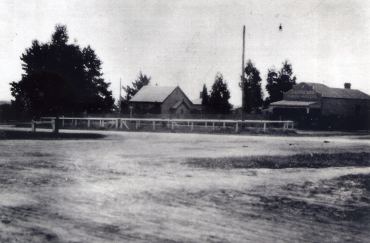 Christ Church Mitcham and Horneman Butchers, situated on Edwards Street. Whitehorse Road in the foreground