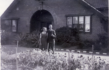 Edgar Edwardes Walkers' house at 8 Meerut Street Mitcham. Two young people standing in front