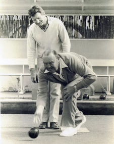 Bob Pratt Snr. (on right) with Bob Pratt Jnr on the green at the Bennettswood Bowling Club