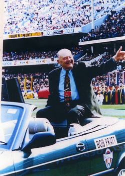 Bob Pratt circling the MCG in a car