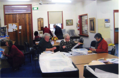 Whitehorse Historical Society members collating the Newsletter in 2008