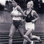 Dot Browne running on an athletics track.