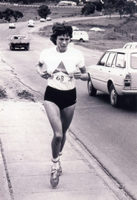  Dot Browne during an athletic event beside a public road.