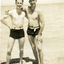 Two men in bathers on beach during the St Luke's Anglican Church Sunday school Teachers' picnic at Seaford in 1947.