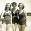 Four young women in bathers on the beach during the St Luke's Anglican Church Sunday School Teachers' picnic at Seaford in 1947.