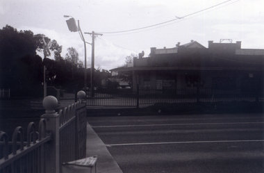 Photograph, Looking across crossing towards liquor store, 1/06/2009