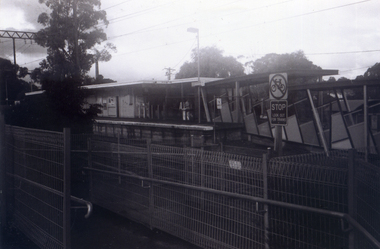Black & white photograph of the precinct surrounding the Nunawading Station and the Springvale Road Railway crossing. 
