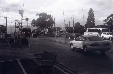 Black & white photograph of the precinct surrounding the Nunawading Station and the Springvale Road Railway crossing. 