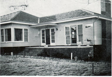 Green Family home at 41 Elmhurst Road Blackburn showing the front garden of the home.