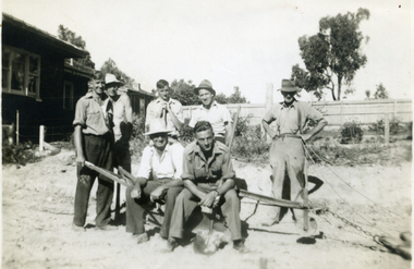 Members of a working bee c1947 making their tennis courts. 