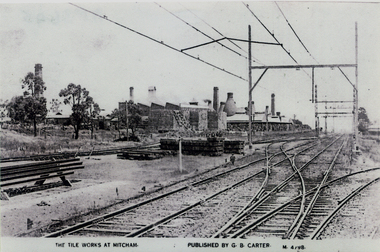 Railway tracks at Mitcham with the Australian Tesselated Tile Works in the background