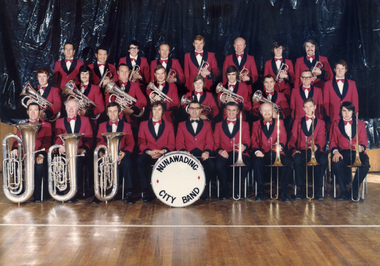  Nunawading City Band (date unknown -established 1969-70)showing the 26 members in their red and black jackets and red tie with their band instruments.