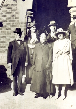 Group of six people at a wedding. 