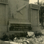 gravestone in Werhmont cemetery with aeroplane in relief.