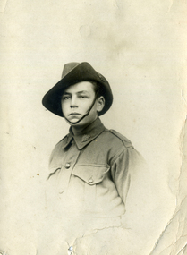  Post card of a soldier in uniform.