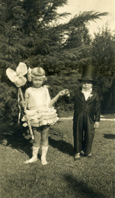 Two children in fancy dress. 