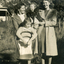 Dorothy Verral. Alison Till, wearing a pale overcoat, on r