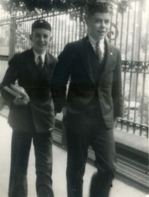  two young men wearing suits. taller boy is Alwyn Till.