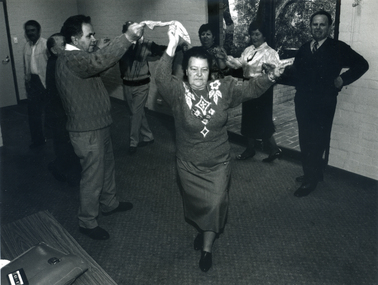  Greek elderly citizens performing a traditional Greek dance. 