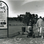 Morak Public Golf Course, Vermont South. Large sign on left and two golfers heading out on right. 1994