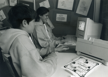 Two Livingstone Primary students using a classroom computer. 1994