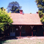 coloured photographs (a-h) of the Matheson house and orchard on Springvale Road, East Burwood. House, shed, windmill, old orchard and pine and cyprus in the photographs.