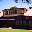 coloured photographs (a-h) of the Matheson house and orchard on Springvale Road, East Burwood. House, shed, windmill, old orchard and pine and cyprus in the photographs.