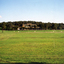 Early days in the development of the Morack Golf Course. Overview of a hole plus white patches indicating where trees have been planted.