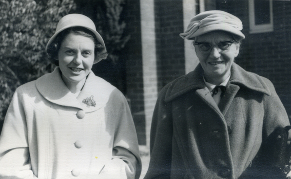 Alison Till and her mother Evelyn Till outside a house.