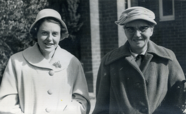 Alison Till and her mother Evelyn Till outside a house.