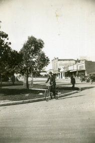  Young man on a bicycle. 